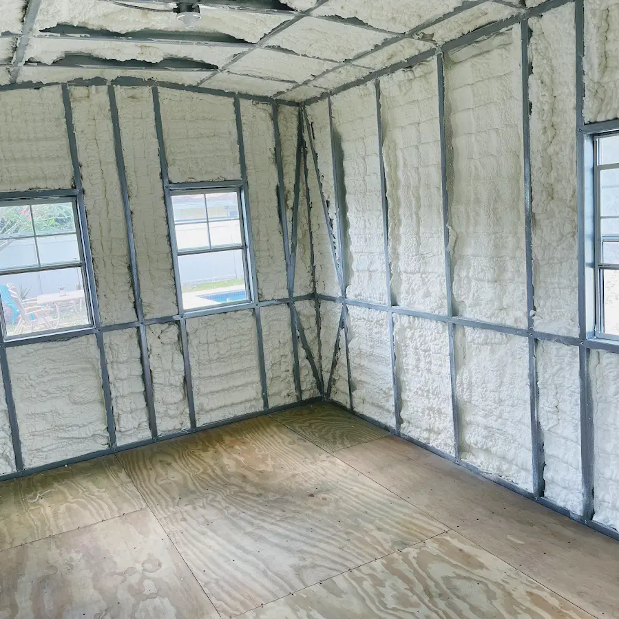 Closed-cell spray foam insulation applied to wall cavities in a residential project in Summit